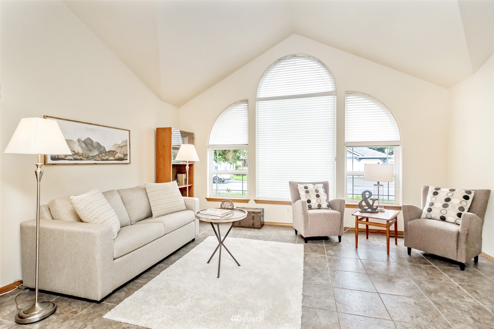 25815 176th Place Southeast Covington, WA 98042 - Photo 10 of 36 a living room with furniture and a large window
