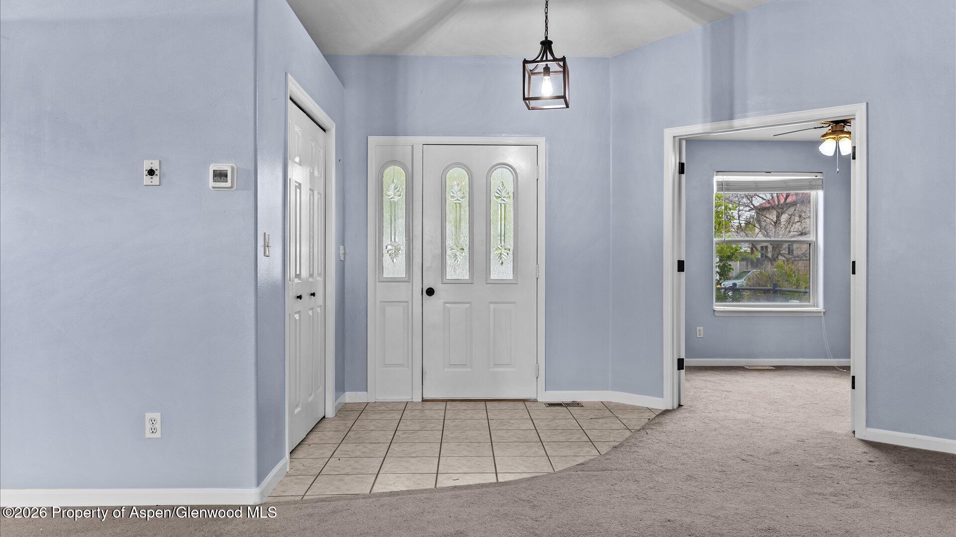 1459 Anvil View Avenue Rifle, CO 81650 - Photo 3 of 29 a view of an entryway with a livingroom