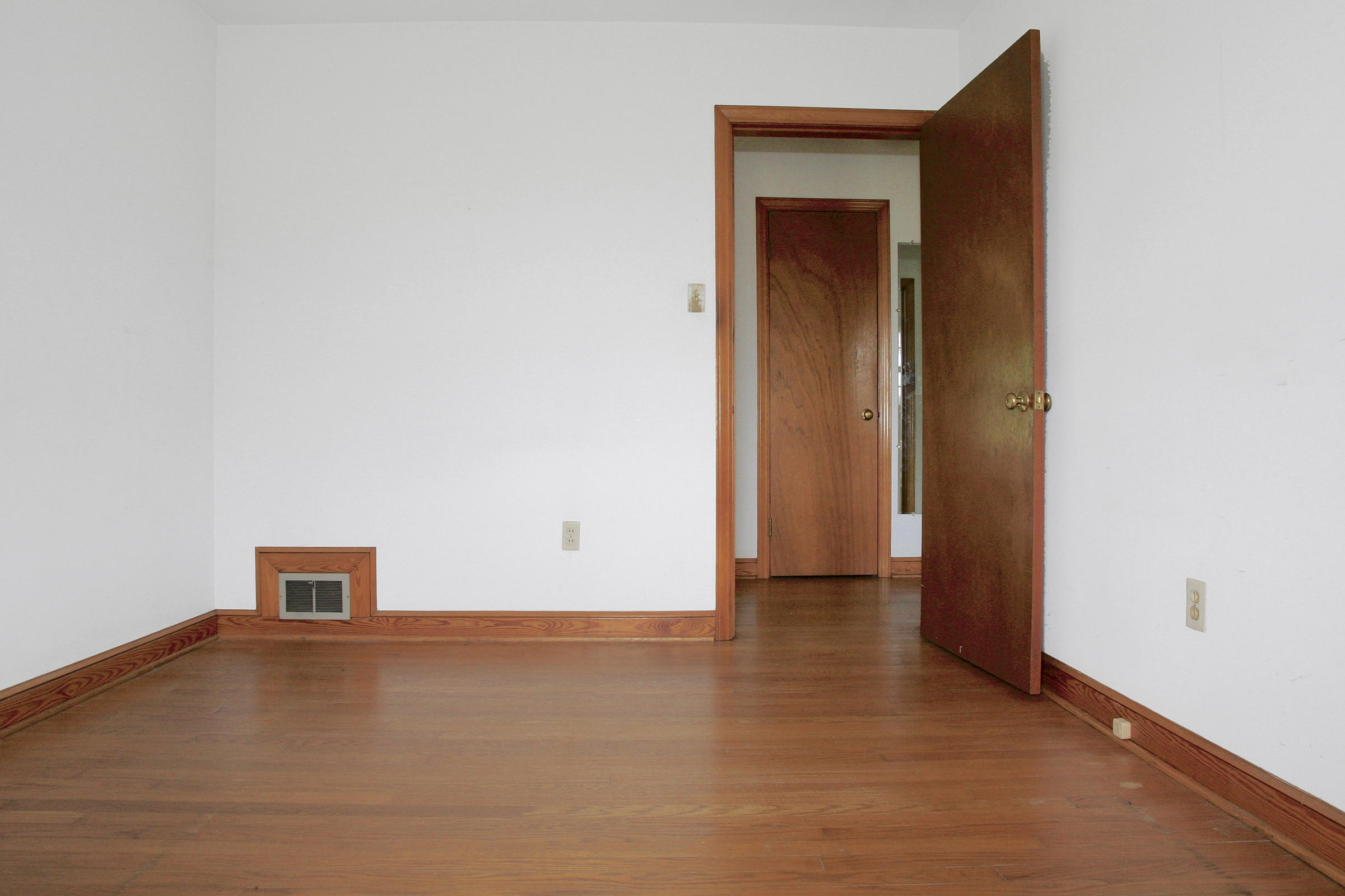 1058 Silverleaf Road Southeast Floyd, VA 24091 - Photo 12 of 55 a view of a room with wooden floor and a ceiling fan