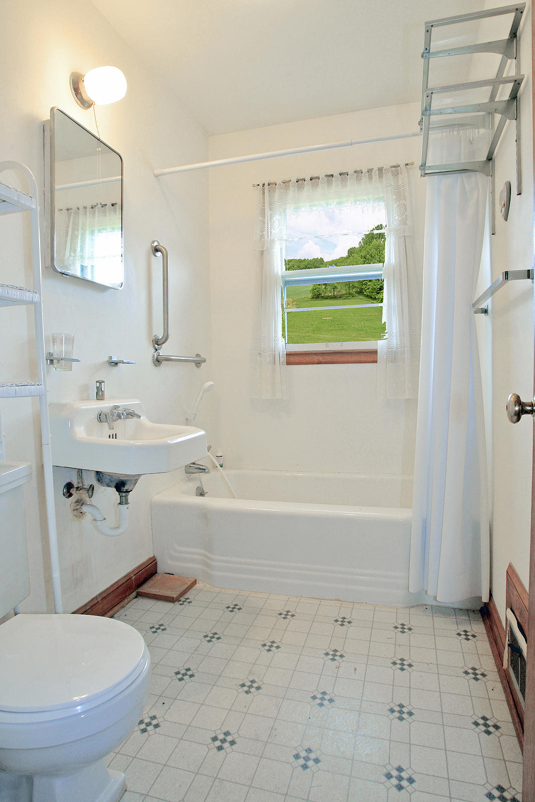 1058 Silverleaf Road Southeast Floyd, VA 24091 - Photo 18 of 55 a bathroom with a sink toilet and shower