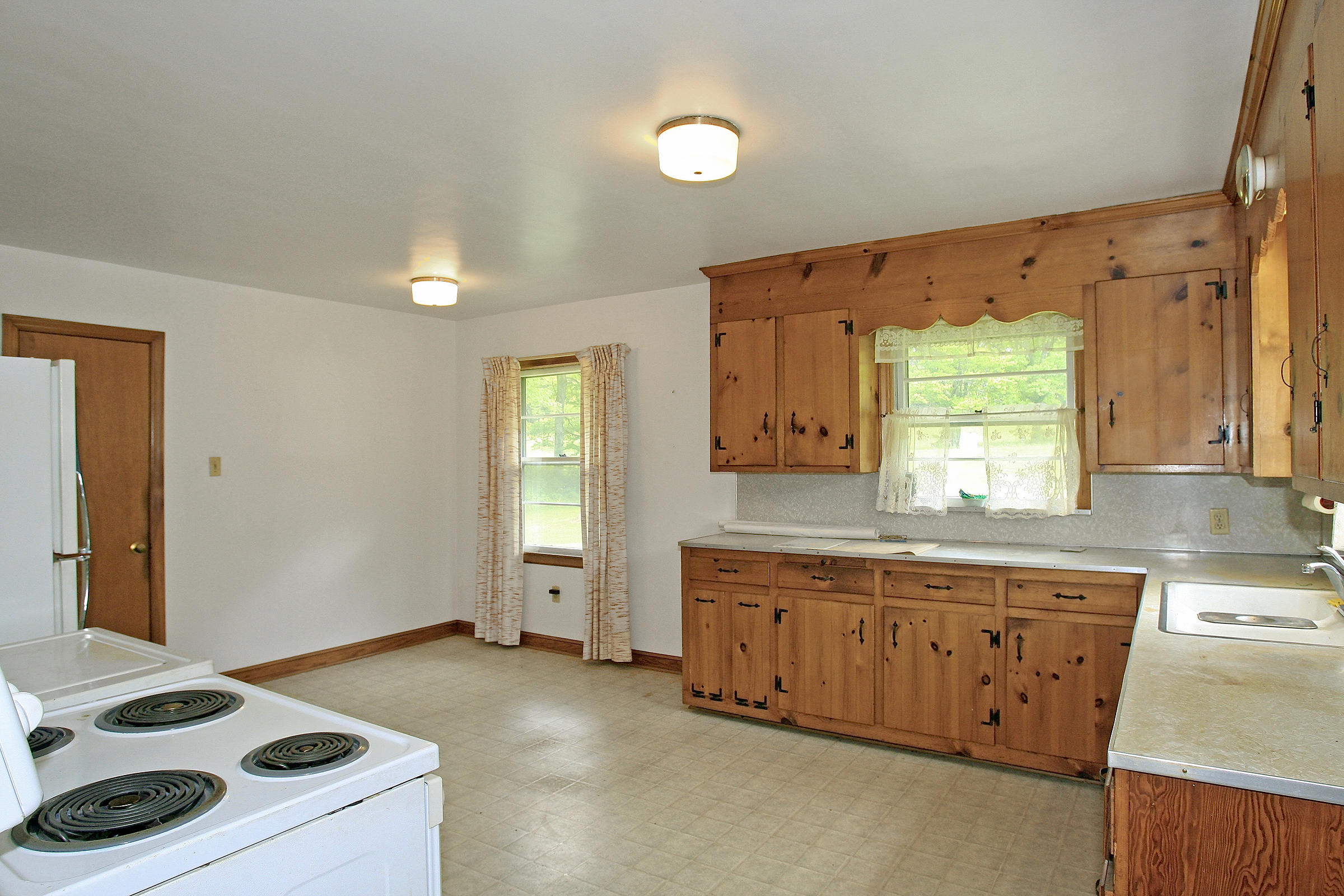 1058 Silverleaf Road Southeast Floyd, VA 24091 - Photo 22 of 55 a kitchen with a cabinets and window