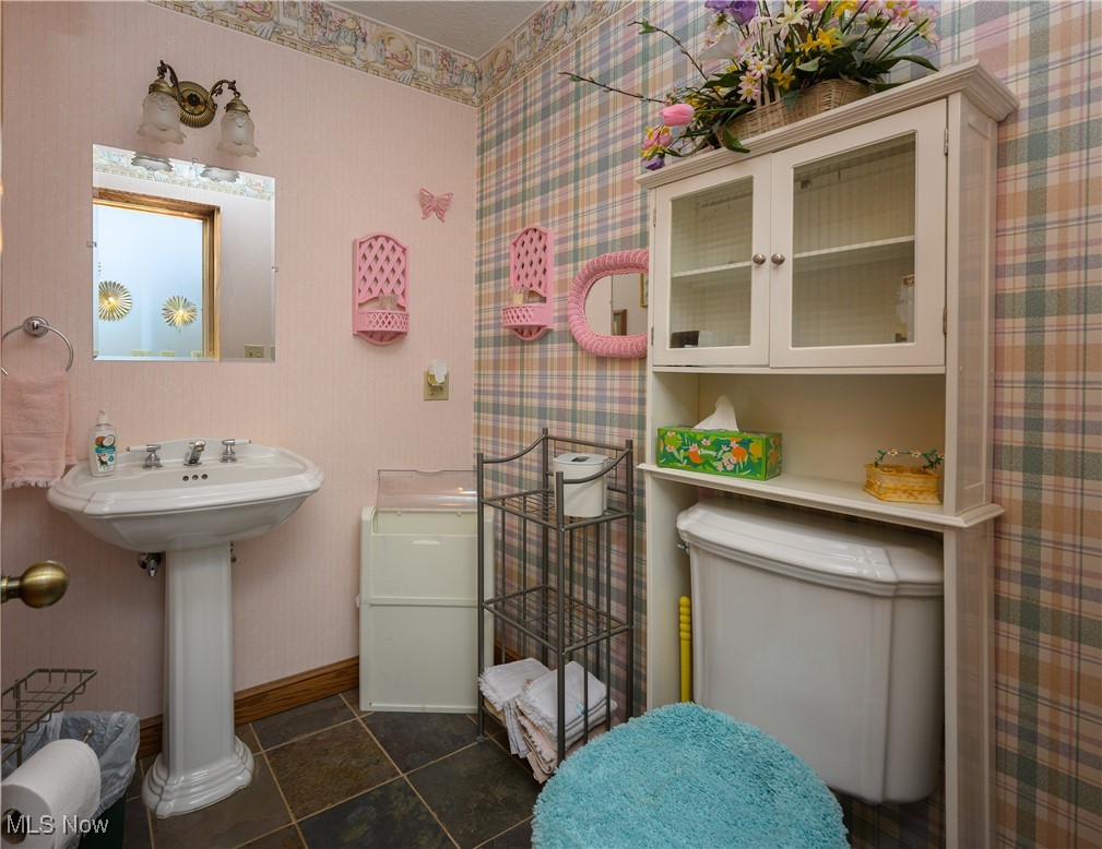 1427 Terrace Road Northwest New Philadelphia, OH 44663 - Photo 23 of 44 Bathroom featuring wallpapered walls