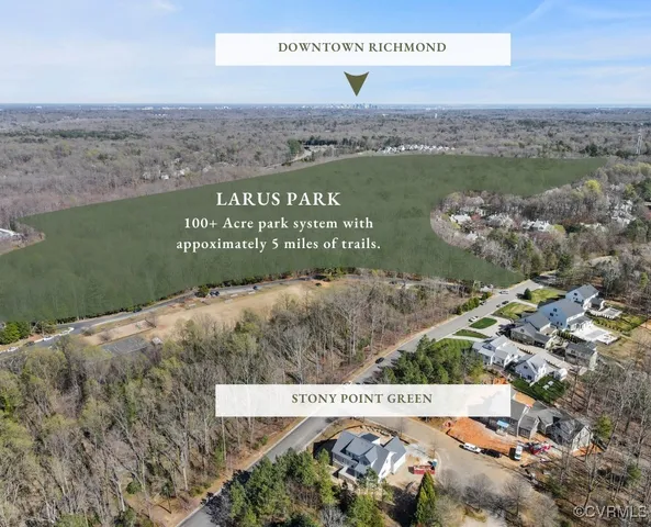 a view of a field with an ocean view