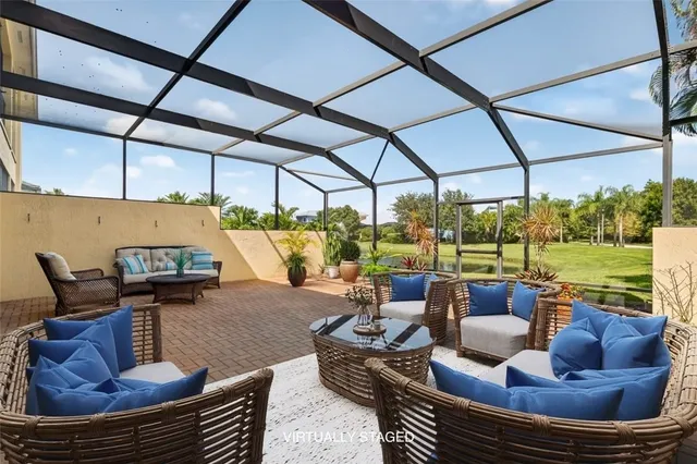 a view of a water fountain and large trees