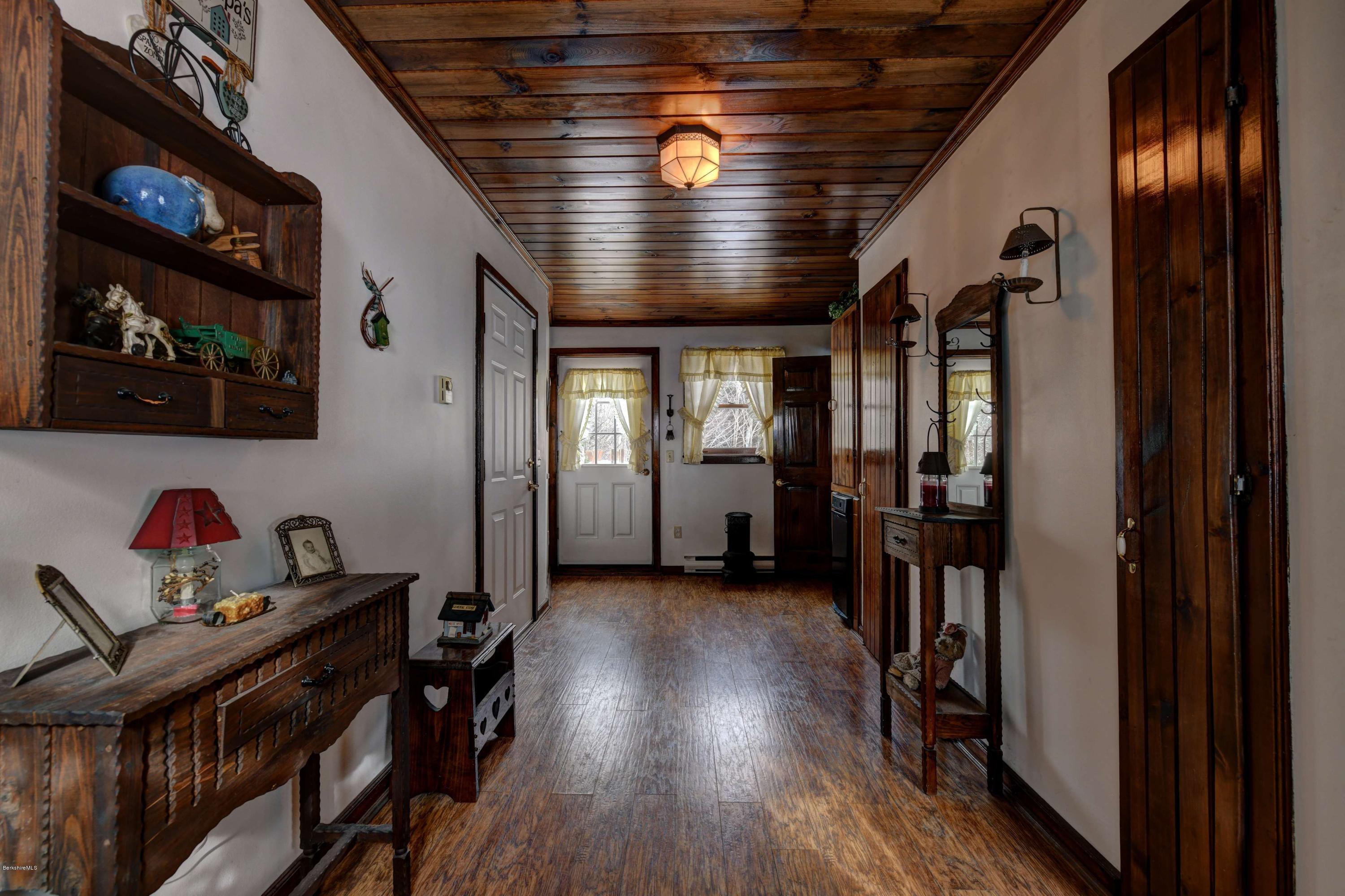 88 Moores Road Florida, MA 01343 - Photo 26 of 53 a view of a hallway with wooden floor and workspace