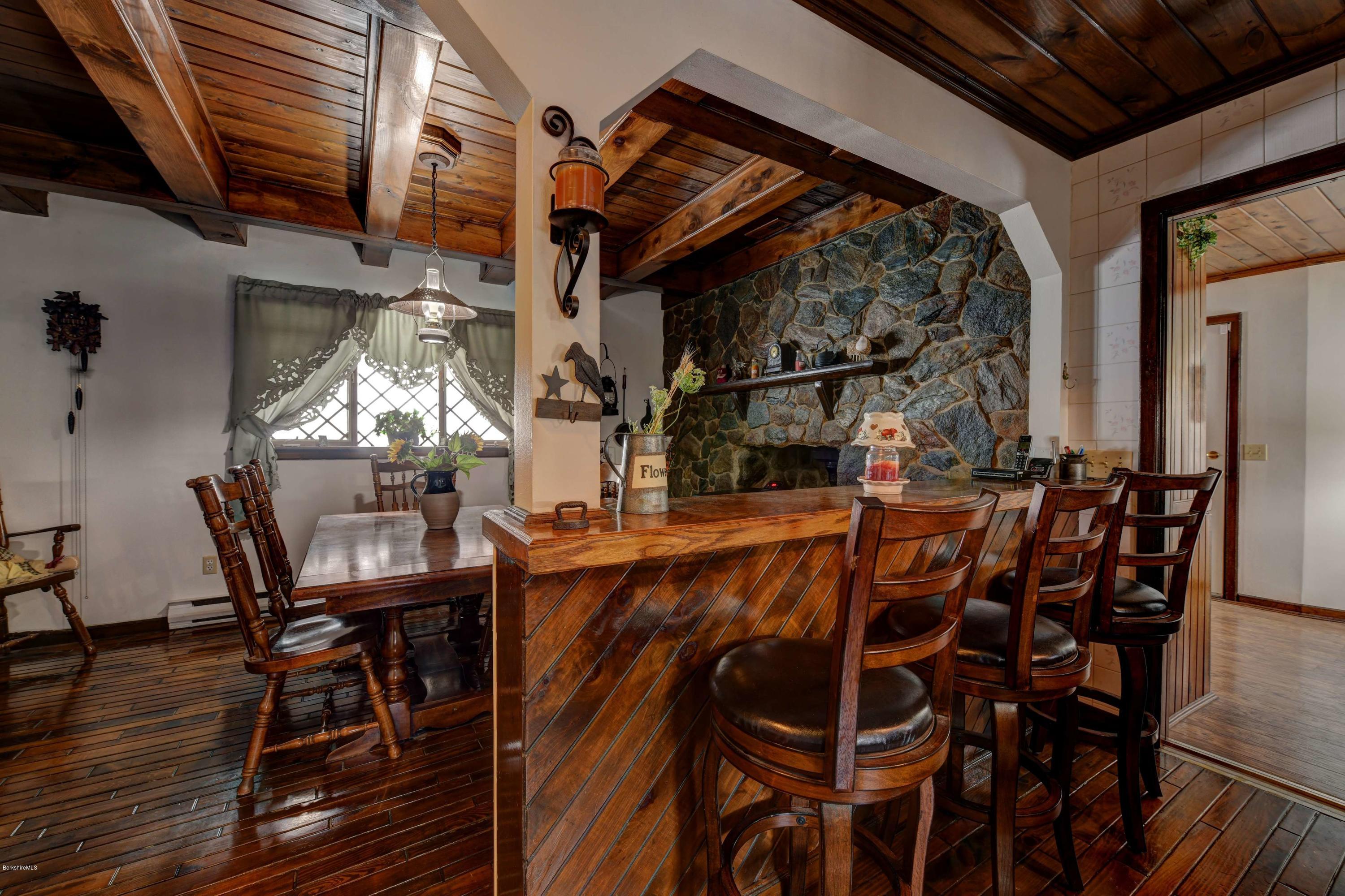 88 Moores Road Florida, MA 01343 - Photo 30 of 53 a view of a dining room with furniture and wooden floor