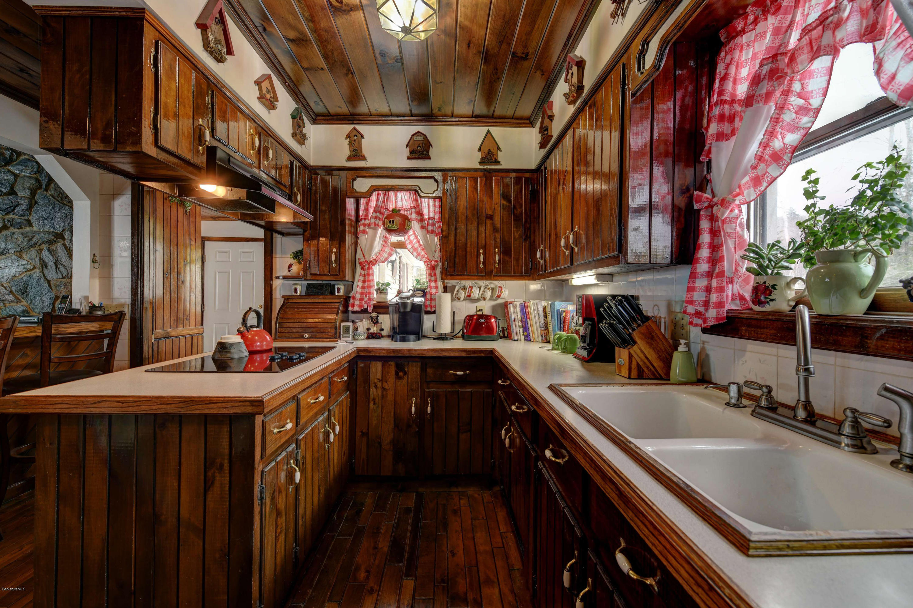 88 Moores Road Florida, MA 01343 - Photo 34 of 53 a kitchen that has a sink and a stove with wooden floor