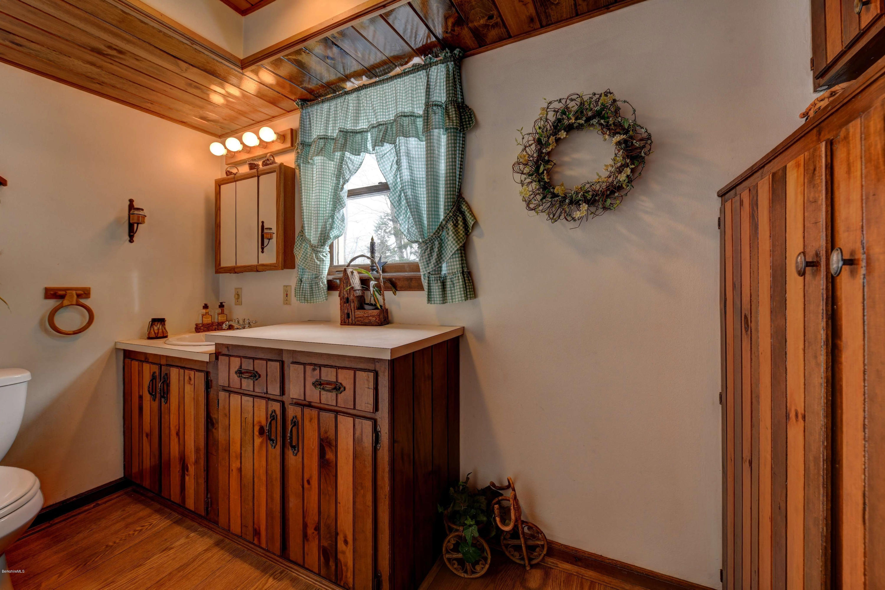 88 Moores Road Florida, MA 01343 - Photo 39 of 53 a bathroom with a sink vanity and a mirror