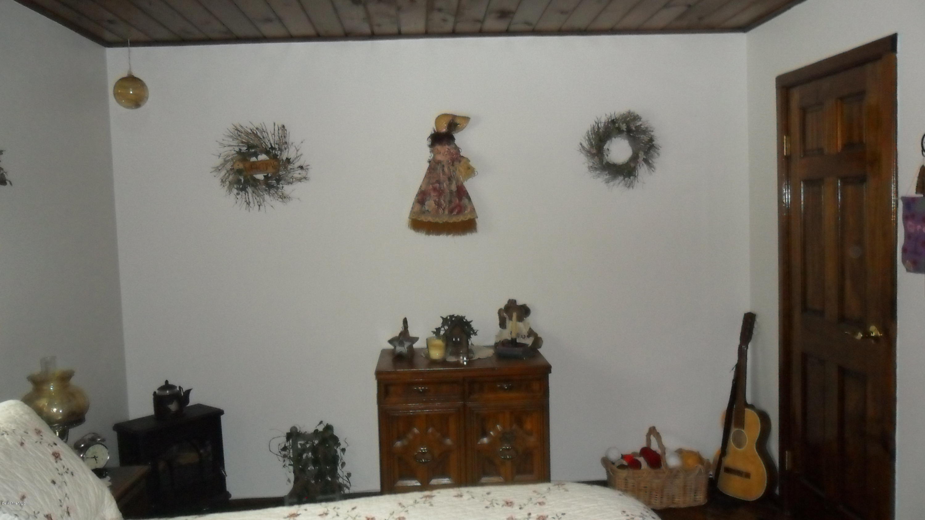 88 Moores Road Florida, MA 01343 - Photo 45 of 53 a room with a table and a chandelier