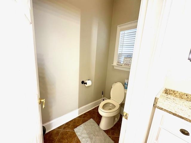4310 Enoch Road Aynor, SC 29511 - Photo 20 of 39 Bathroom with baseboards and dark tile patterned flooring