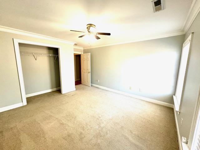 4310 Enoch Road Aynor, SC 29511 - Photo 23 of 39 Unfurnished bedroom with carpet floors, crown molding, a closet, and a ceiling fan