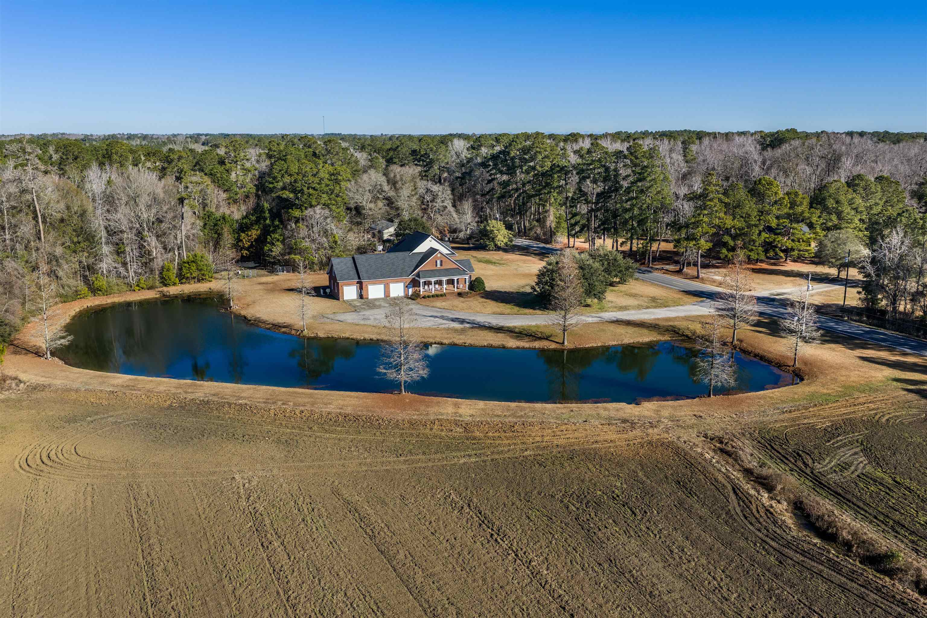 4310 Enoch Road Aynor, SC 29511 - Photo 33 of 39 Drone / aerial view of a large body of water