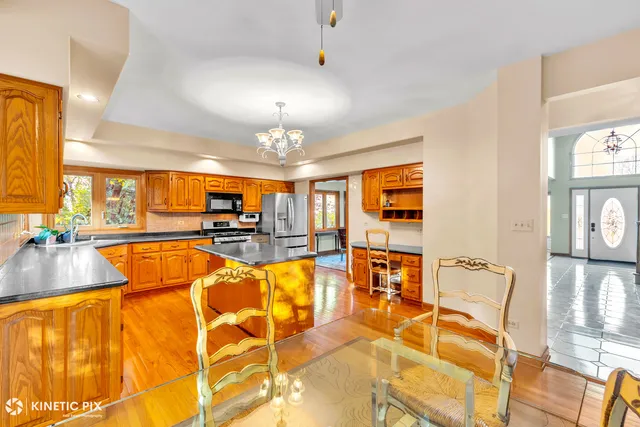 a view of a lobby with furniture and chandelier