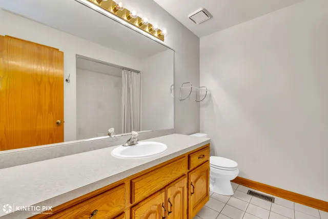 a utility room with a stove a washer and dryer