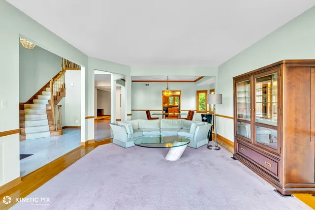 a room with lots of white furniture