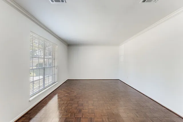 an empty room with windows