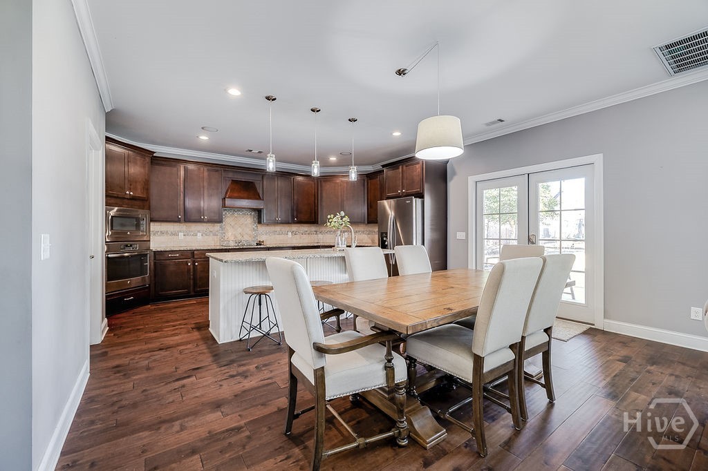 108 Treutlen Court Rincon, GA 31326 - Photo 17 of 55 breakfast area into kitchen