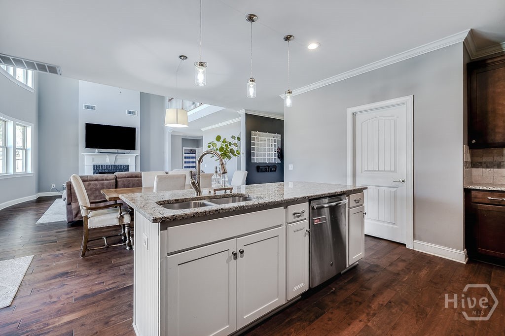 108 Treutlen Court Rincon, GA 31326 - Photo 21 of 55 Kitchen island into living room