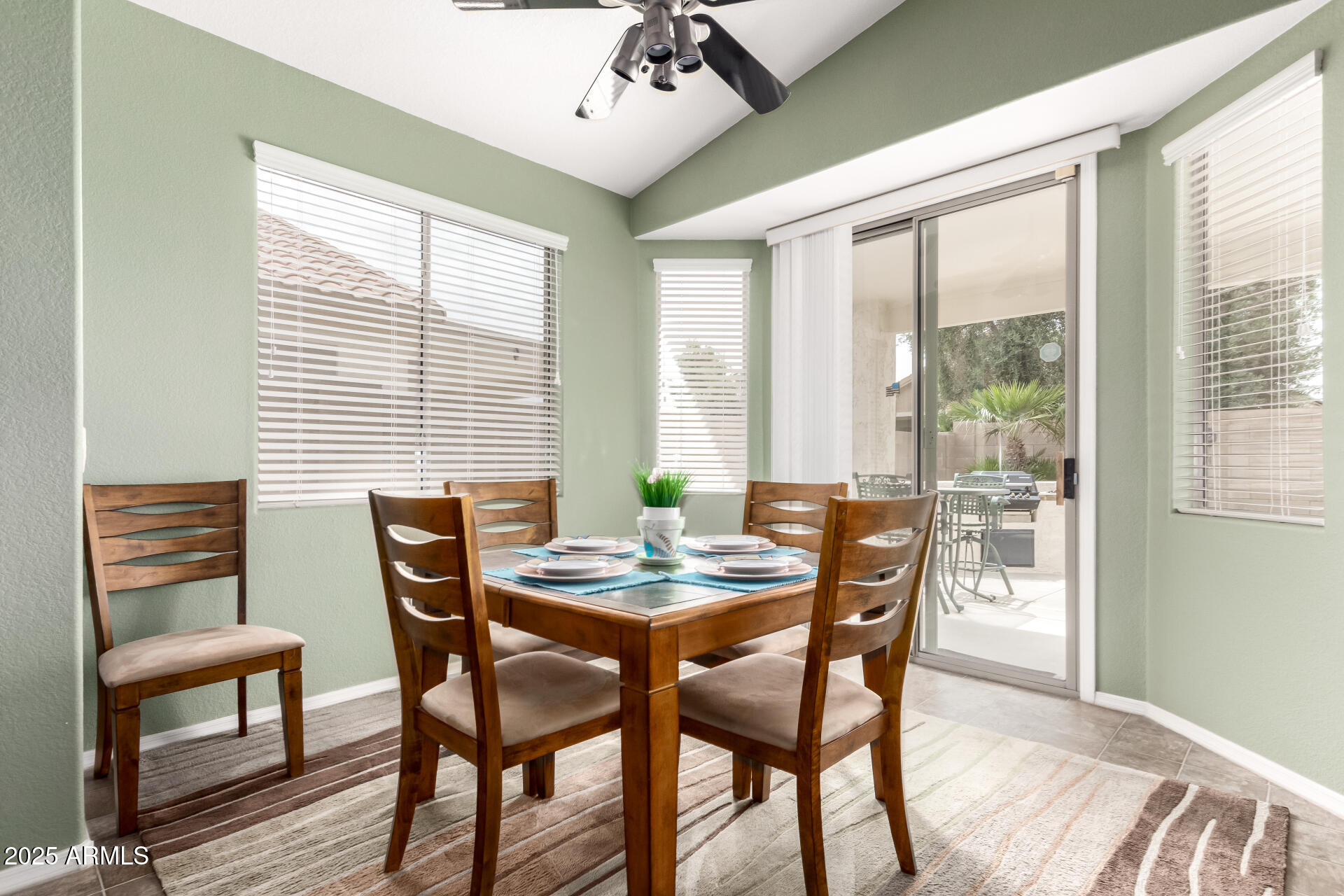 18131 West Addie Lane Surprise, AZ 85374 - Photo 11 of 31 a dining room with furniture and window