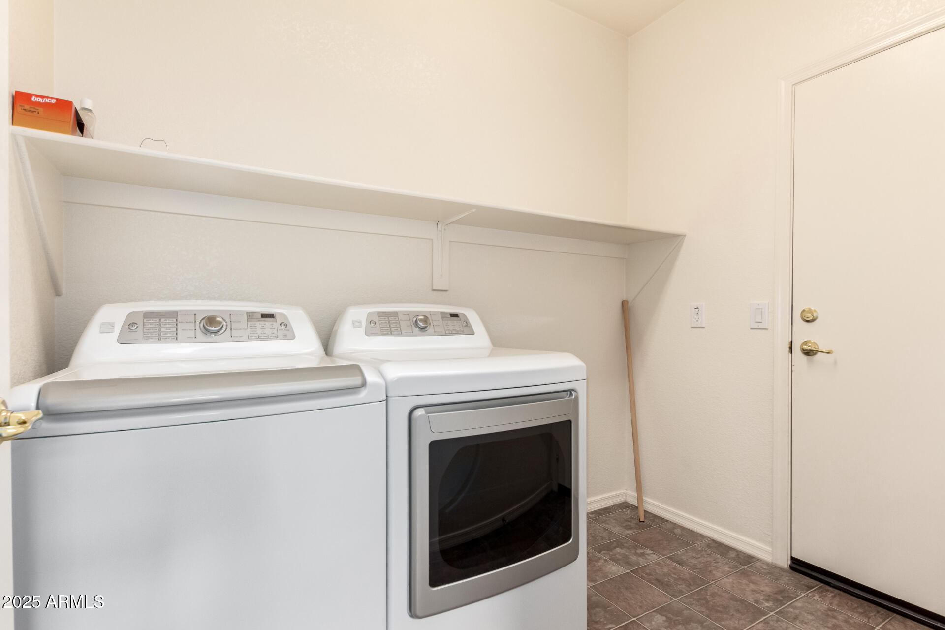 18131 West Addie Lane Surprise, AZ 85374 - Photo 26 of 31 a utility room with dryer and washer