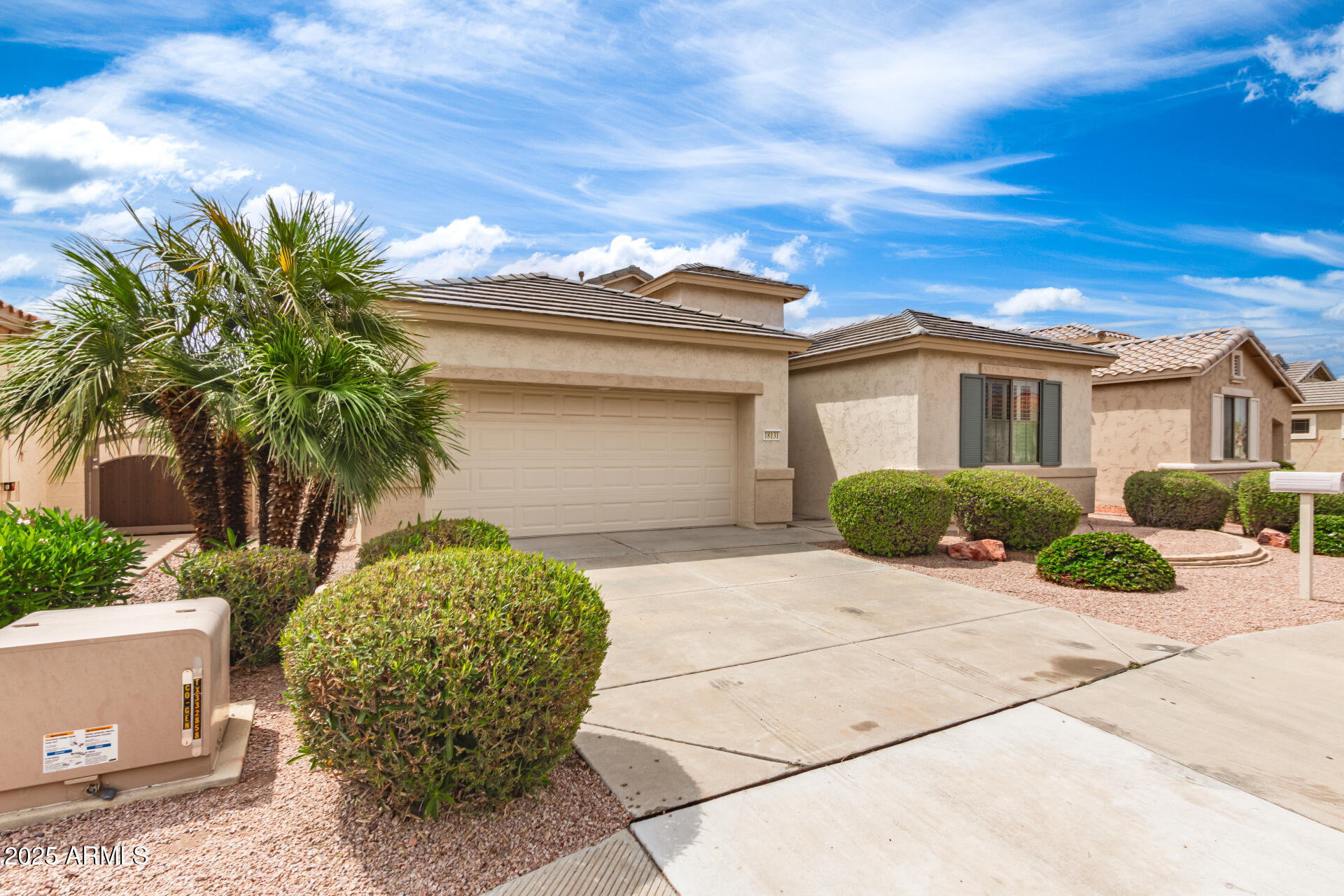 18131 West Addie Lane Surprise, AZ 85374 - Photo 3 of 31 a view of a house with a patio