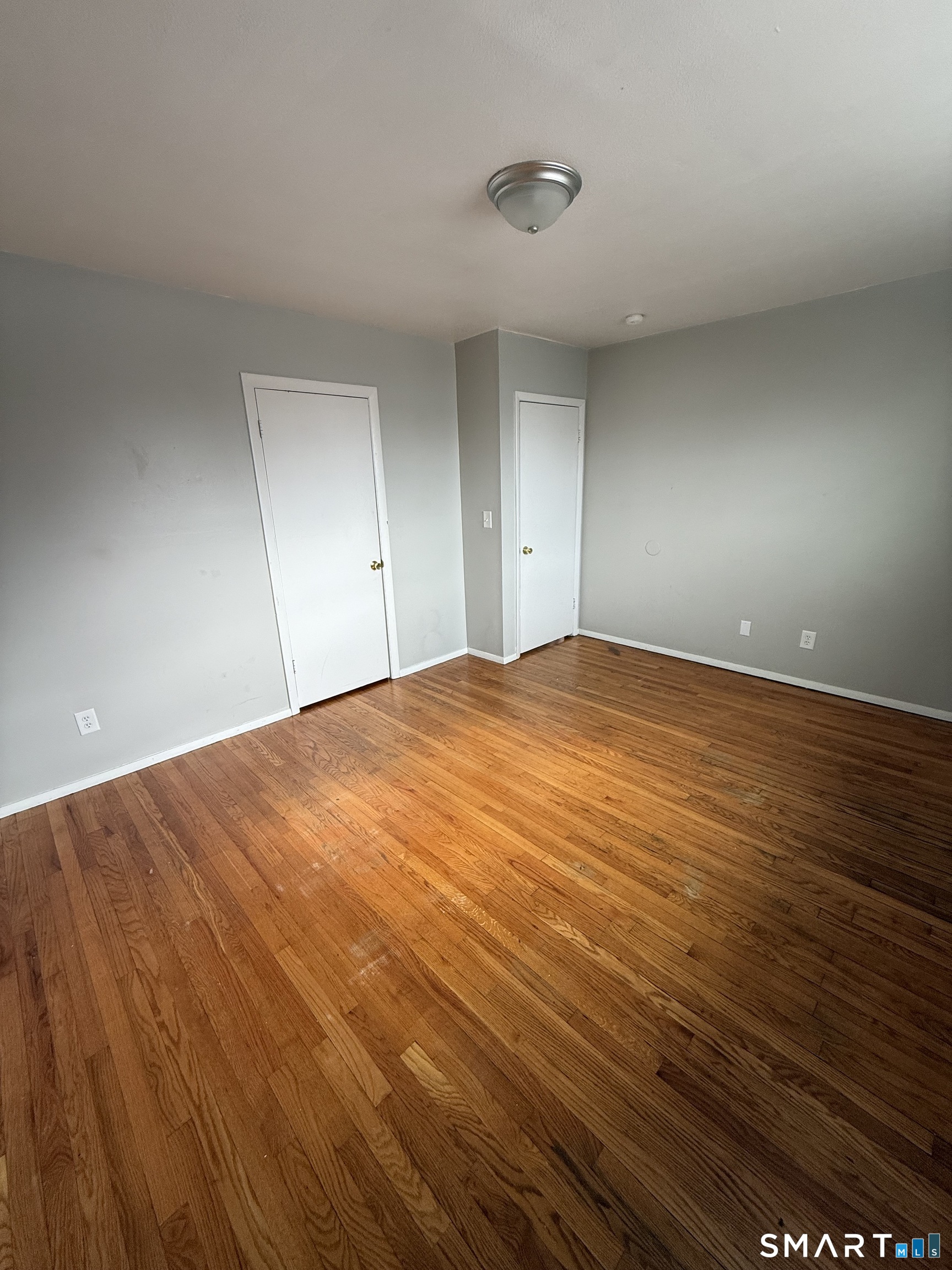 33 Allen Place New Haven, CT 06512 - Photo 13 of 23 a view of empty room with wooden floor