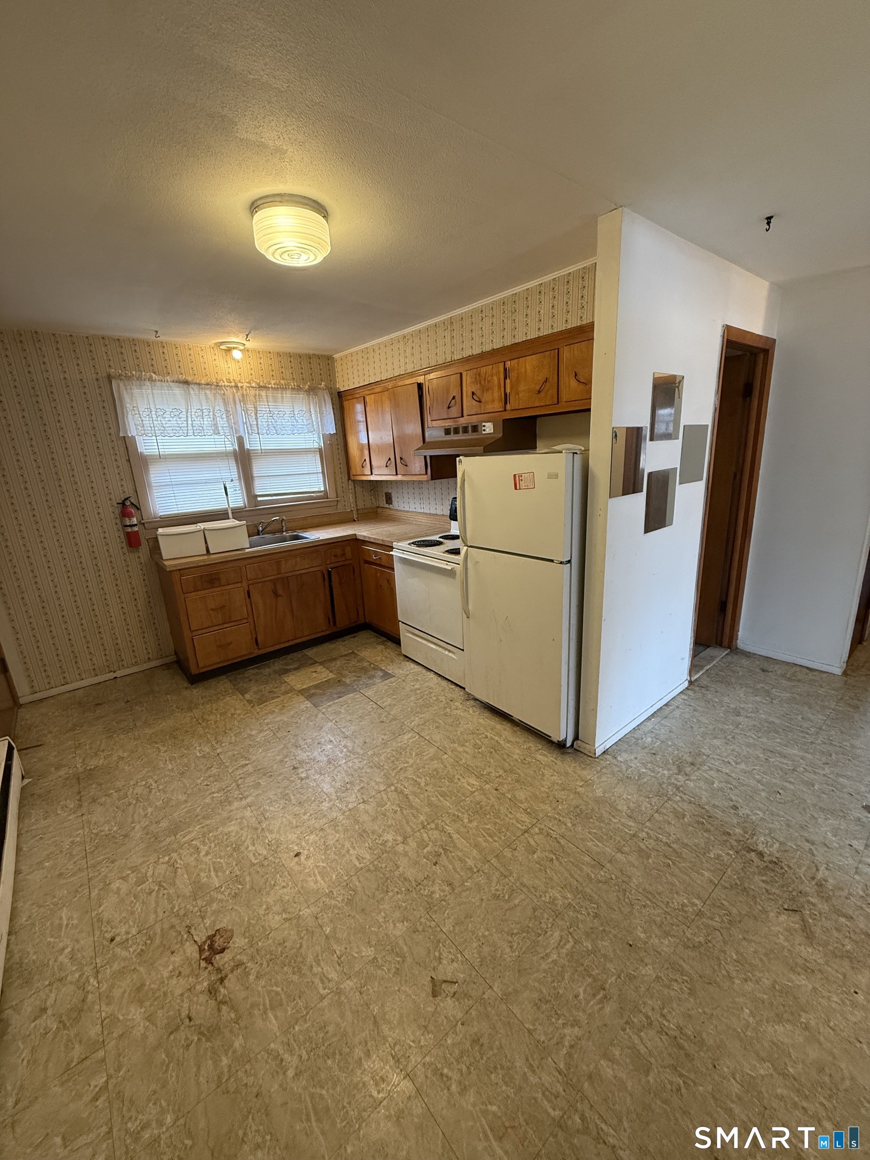 33 Allen Place New Haven, CT 06512 - Photo 17 of 23 a storage room with washer and dryer