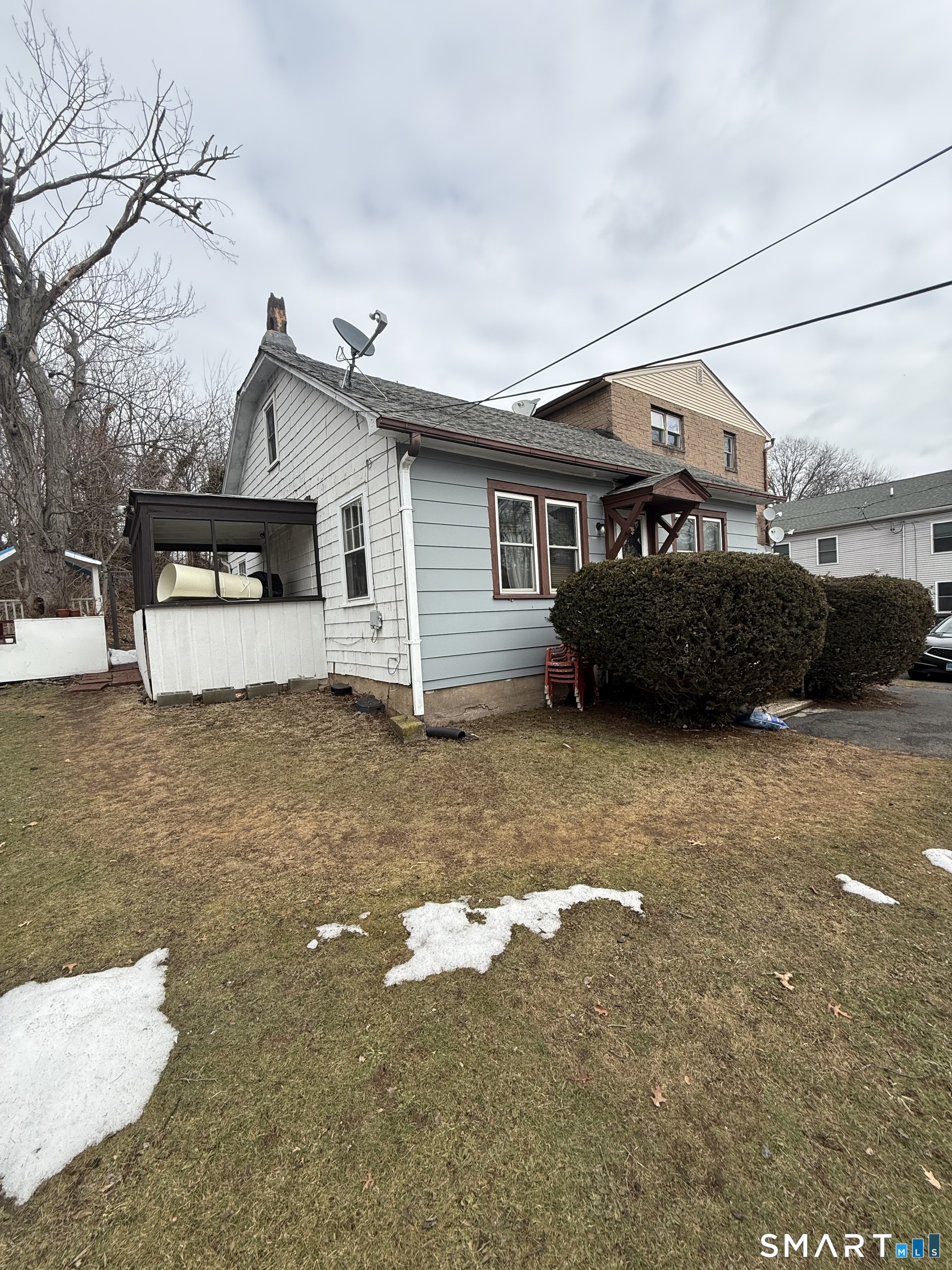 33 Allen Place New Haven, CT 06512 - Photo 3 of 23 a view of a house with a yard