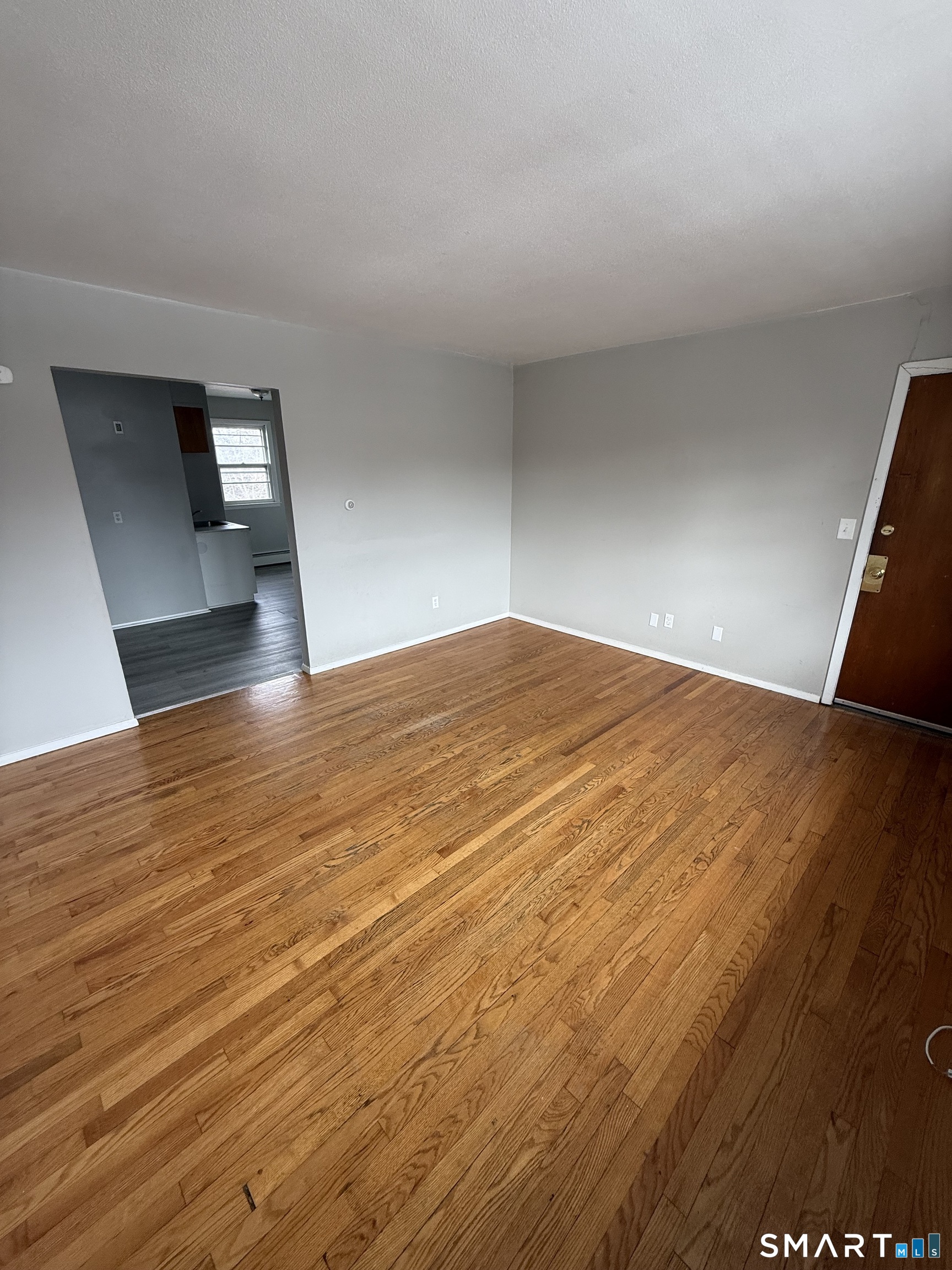 33 Allen Place New Haven, CT 06512 - Photo 6 of 23 a view of empty room with wooden floor