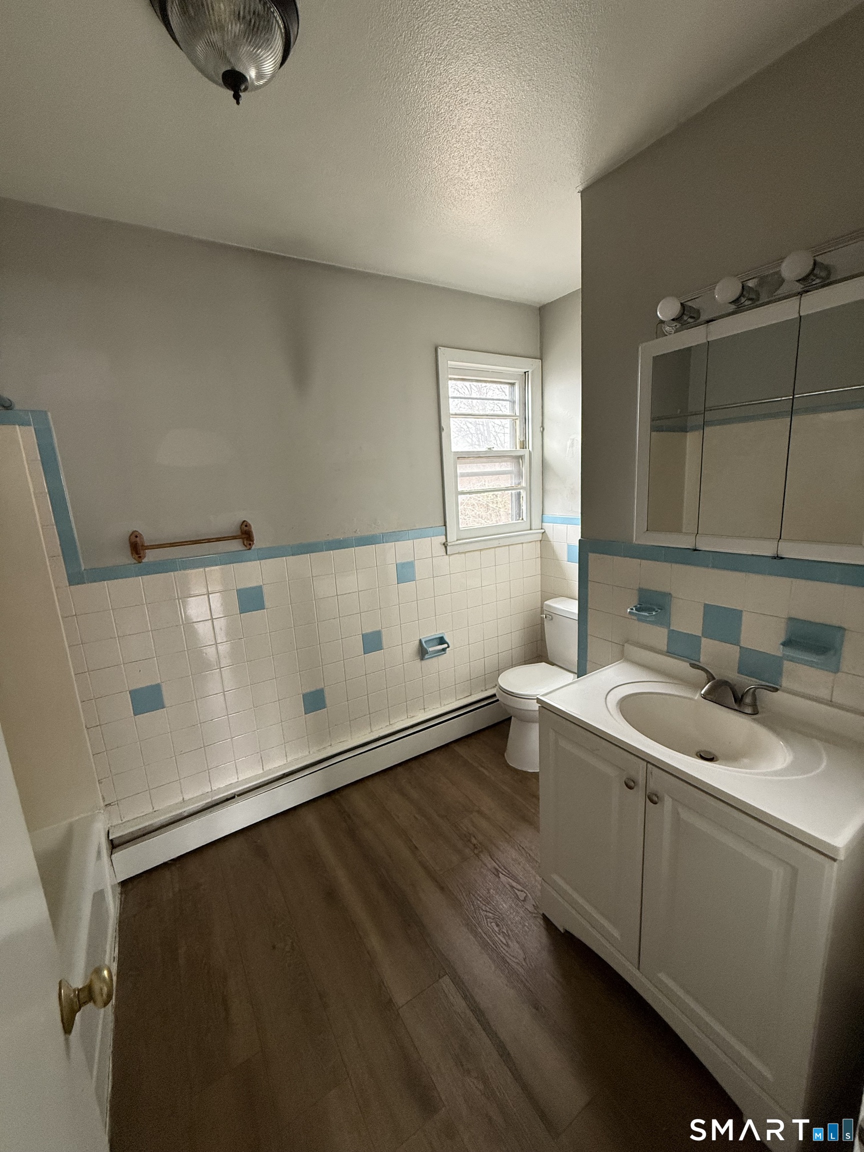 33 Allen Place New Haven, CT 06512 - Photo 9 of 23 a view of a bathroom with a sink and mirror