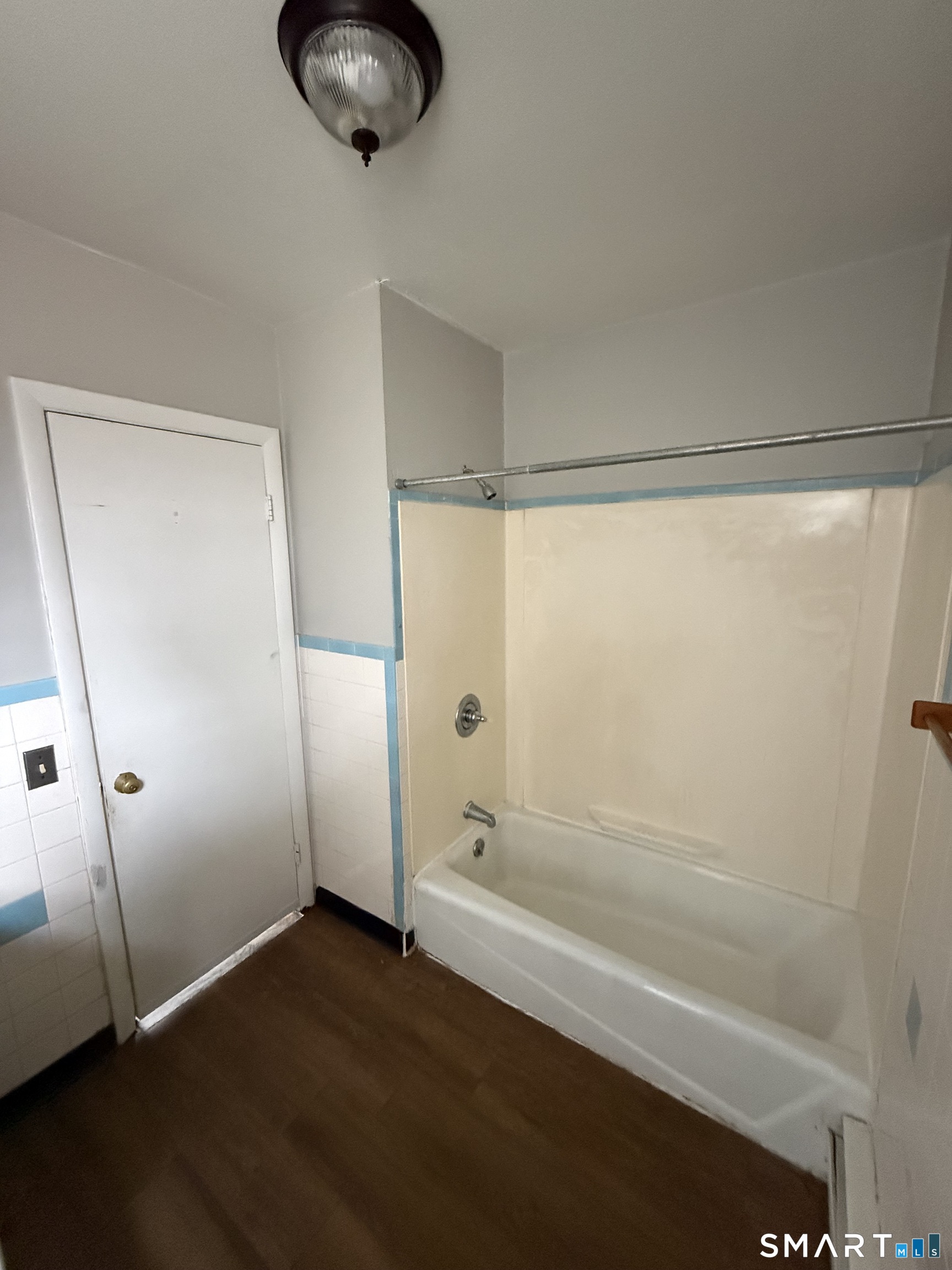 33 Allen Place New Haven, CT 06512 - Photo 10 of 23 a bathroom with a bathtub and a shower
