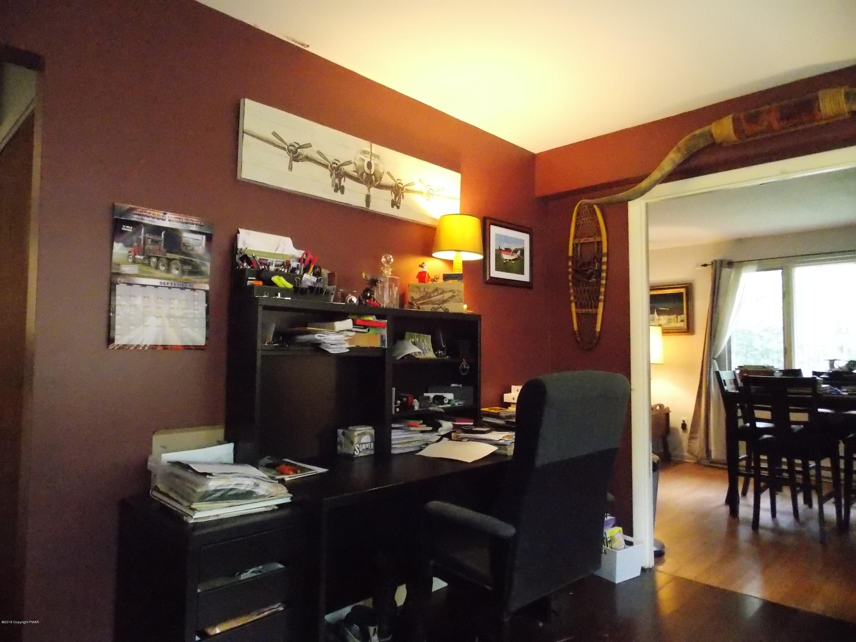 184 Oak Lane Cresco, PA 18326 - Photo 11 of 39 a dining room with furniture and wooden floor
