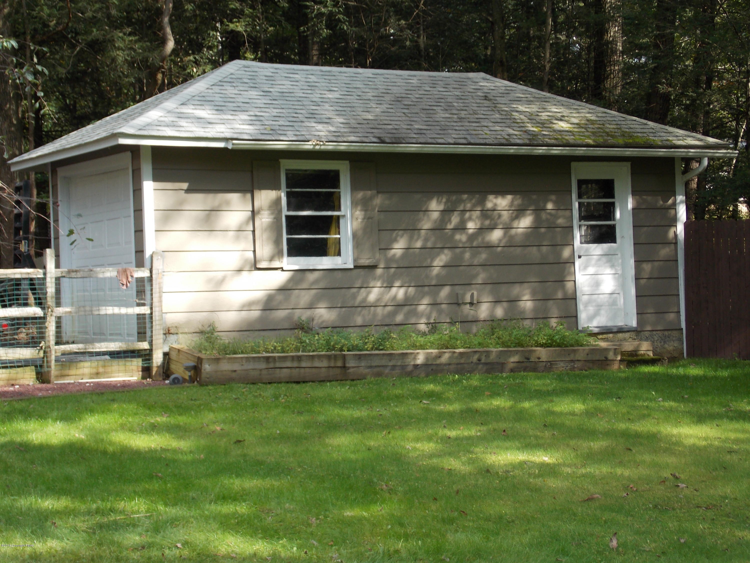 184 Oak Lane Cresco, PA 18326 - Photo 19 of 39 a front view of house with yard