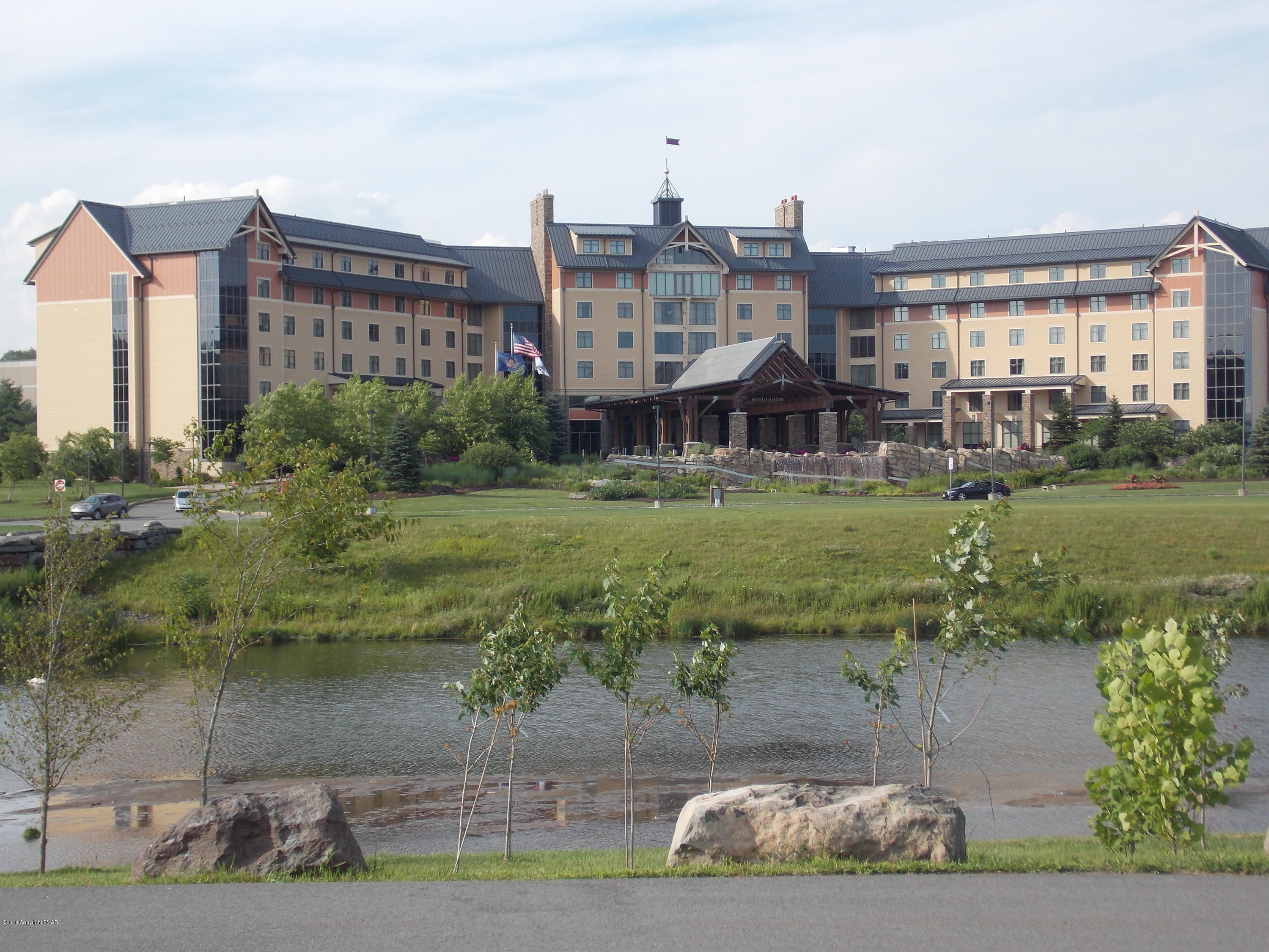 184 Oak Lane Cresco, PA 18326 - Photo 30 of 39 a view of a big yard next to a building