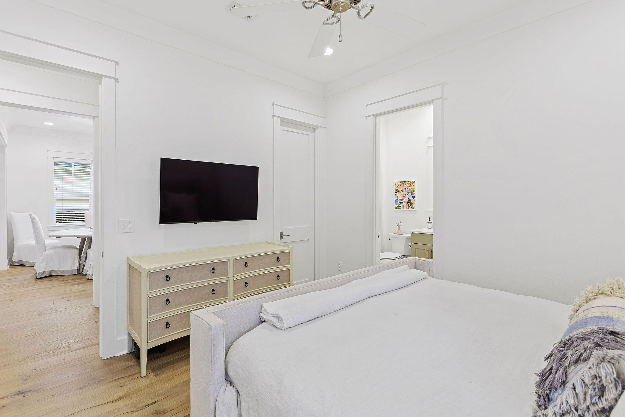 309 Sidecamp Road Watersound, FL 32461 - Photo 16 of 26 a bedroom with a bed and a flat screen tv