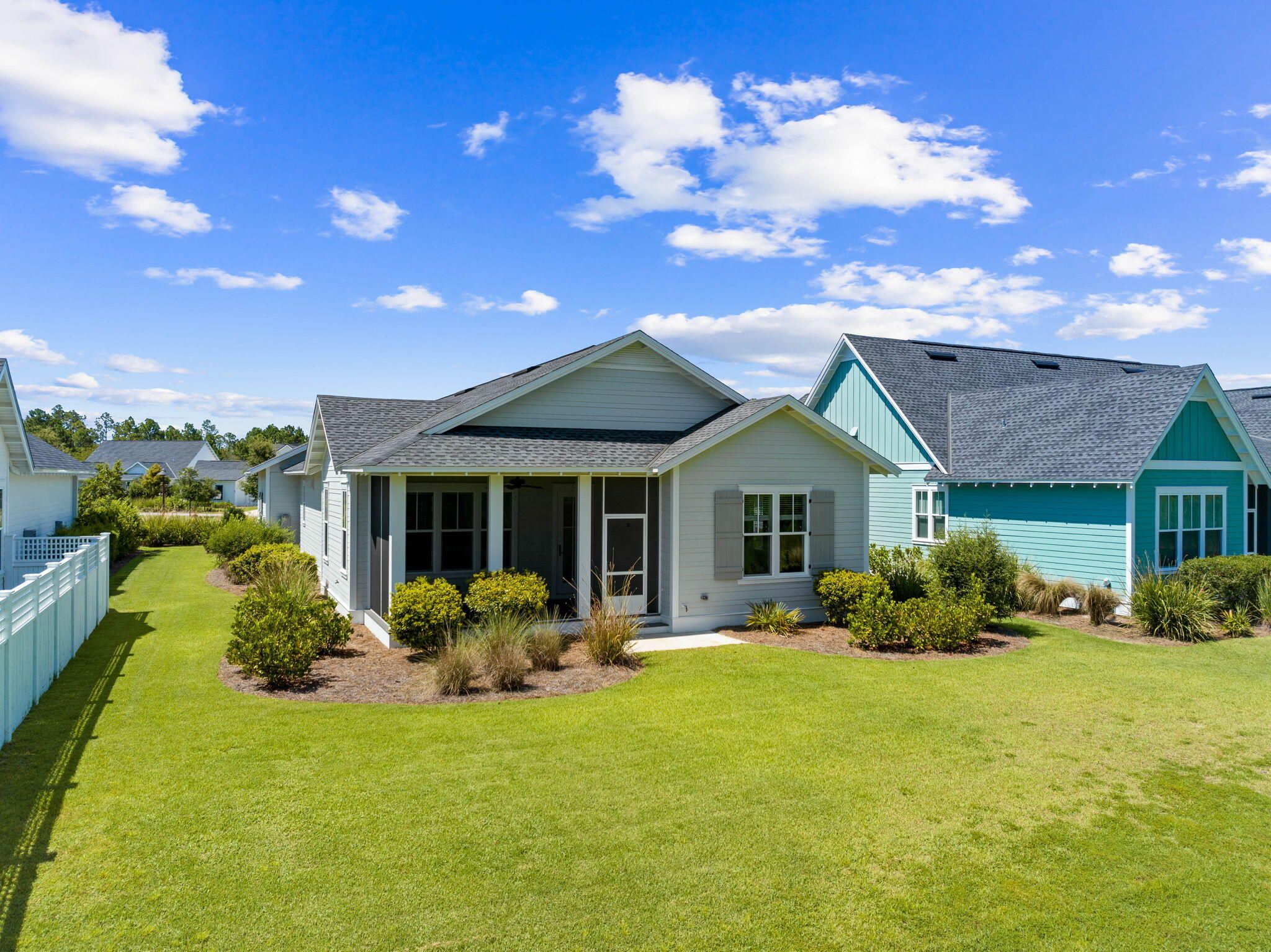 309 Sidecamp Road Watersound, FL 32461 - Photo 22 of 26 a front view of house with yard and green space