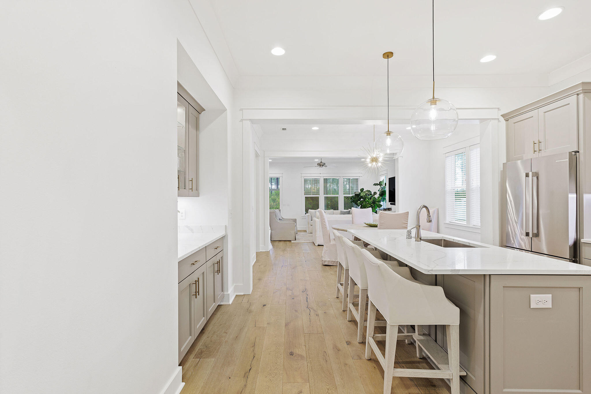 309 Sidecamp Road Watersound, FL 32461 - Photo 5 of 26 a large white kitchen with a large island oven