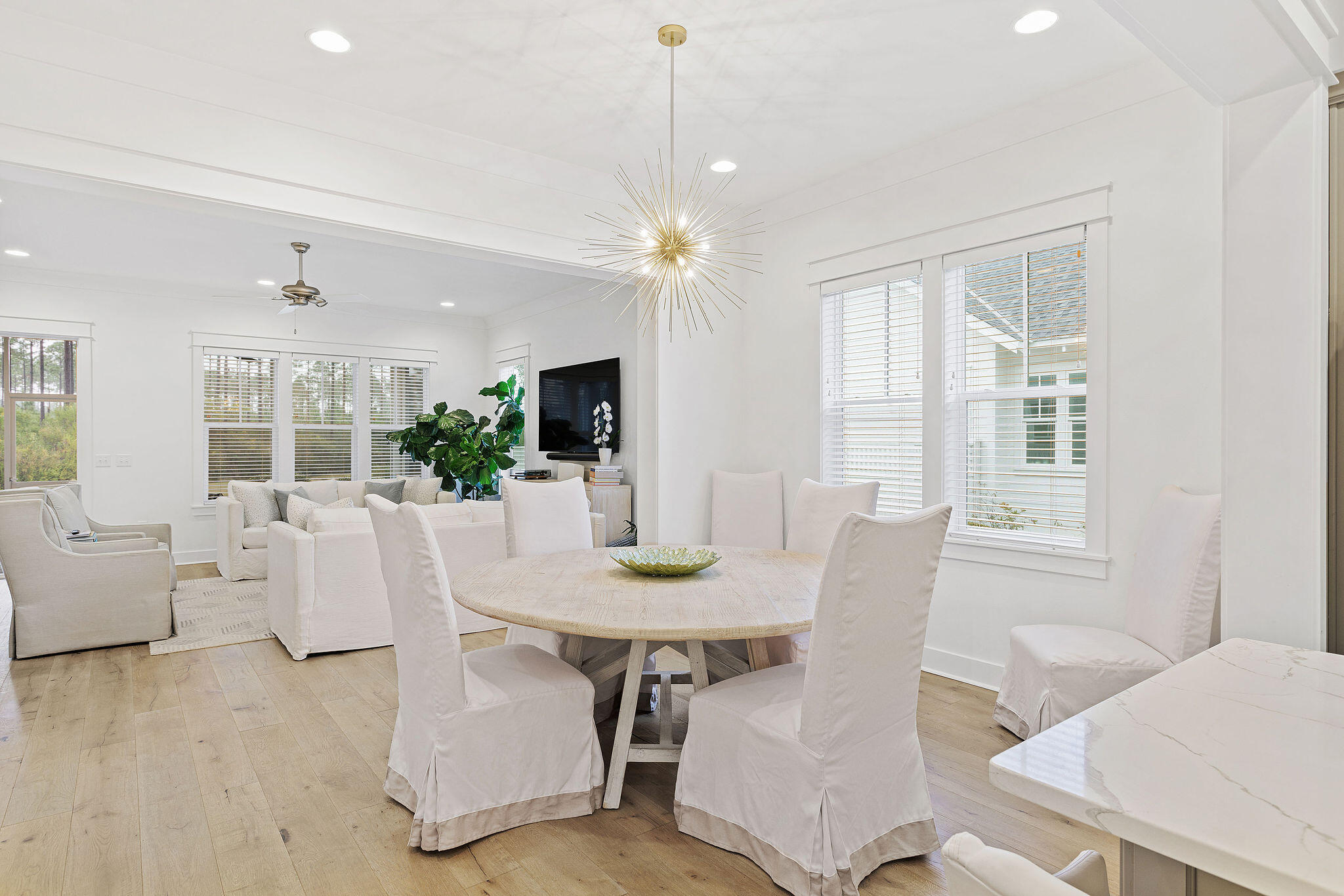 309 Sidecamp Road Watersound, FL 32461 - Photo 8 of 26 a view of a dining room with furniture window and outside view