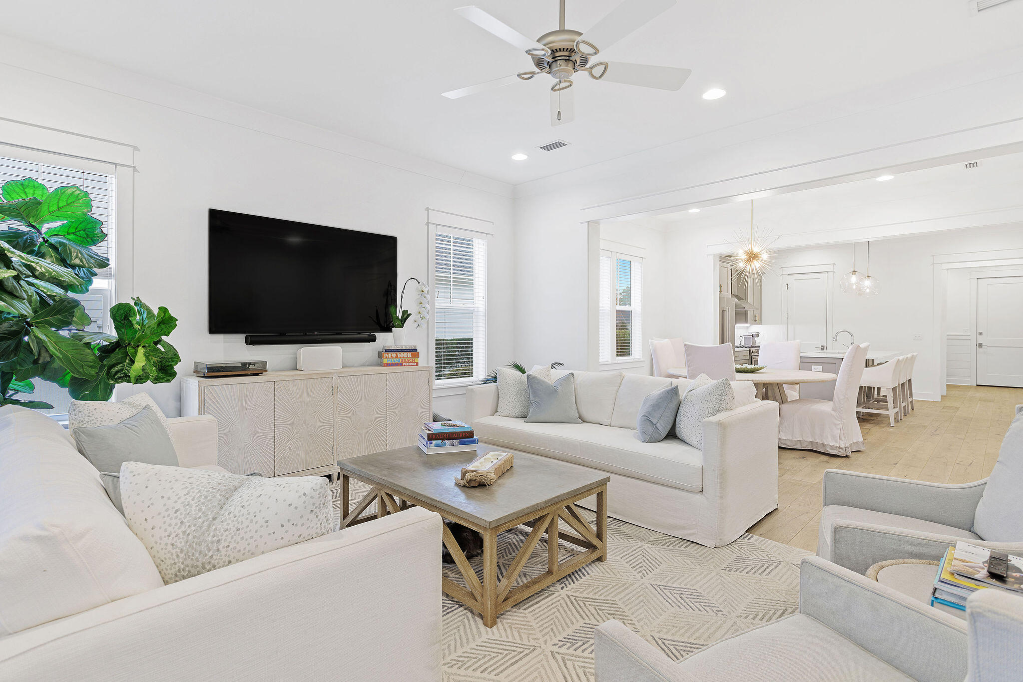 309 Sidecamp Road Watersound, FL 32461 - Photo 10 of 26 a living room with furniture and a flat screen tv