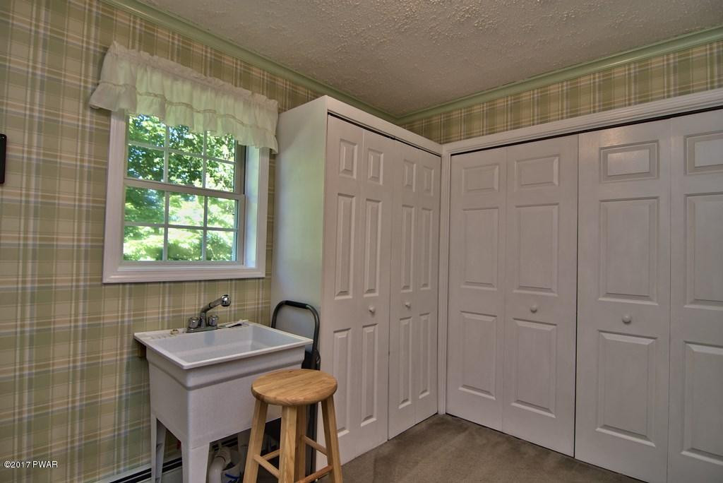 145 Keystone Road Lake Ariel, PA 18436 - Photo 34 of 52 a bathroom with a sink and a mirror