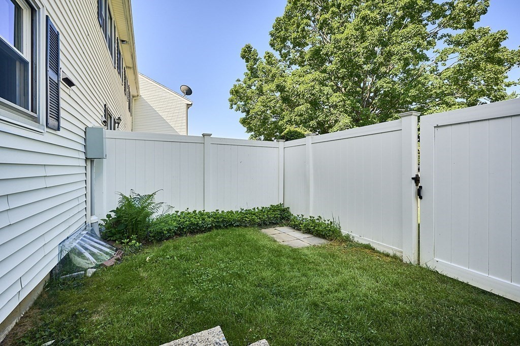 41 South Street, Unit 63 Easthampton, MA 01027 - Photo 19 of 34 a view of a backyard with potted plants