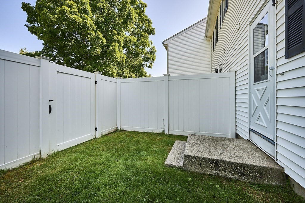 41 South Street, Unit 63 Easthampton, MA 01027 - Photo 20 of 34 a view of a backyard with potted plants
