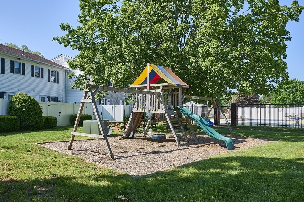 41 South Street, Unit 63 Easthampton, MA 01027 - Photo 24 of 34 a view of playground with a slide and swing