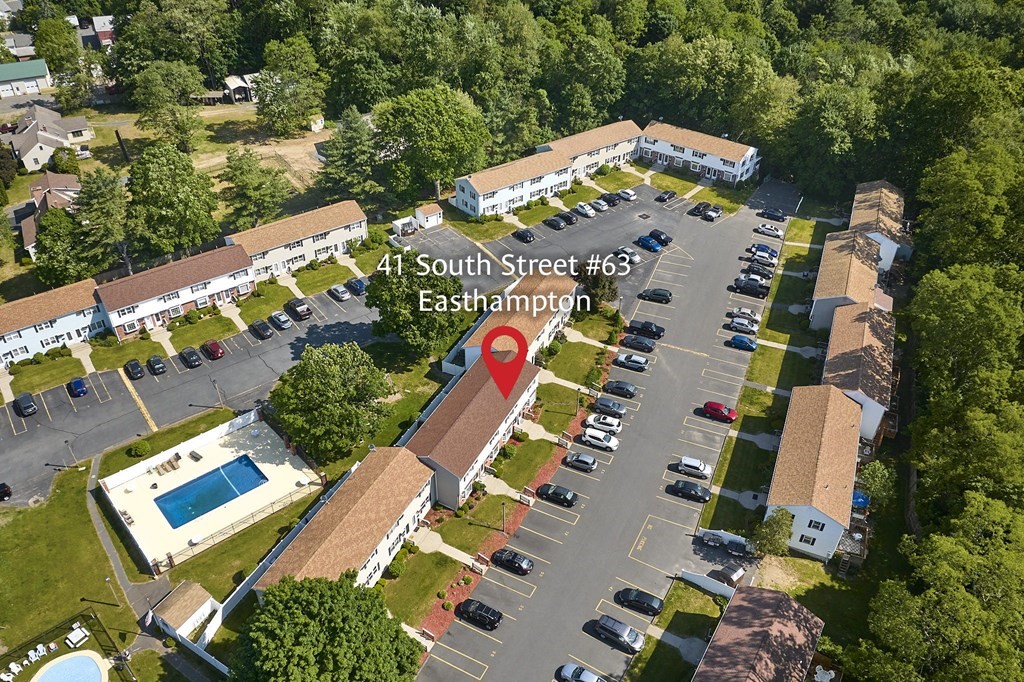 41 South Street, Unit 63 Easthampton, MA 01027 - Photo 28 of 34 an aerial view of residential house with outdoor space and parking