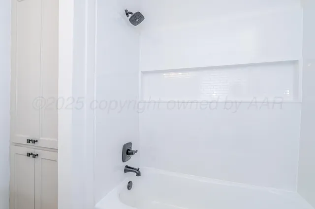 a bathroom with a bathtub