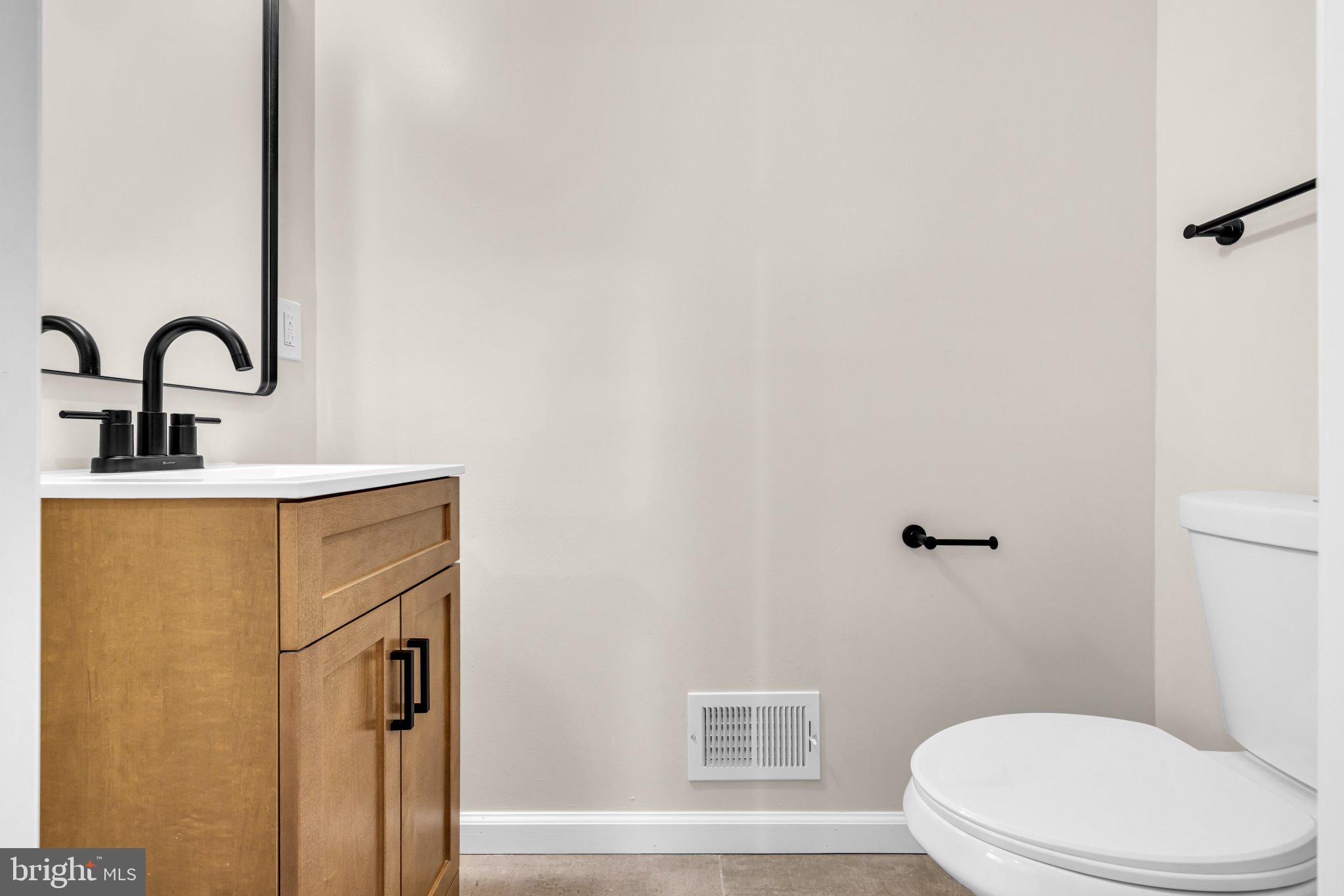 1622 Hazel Street Baltimore, MD 21226 - Photo 7 of 40 Sleek and modern bathroom design.