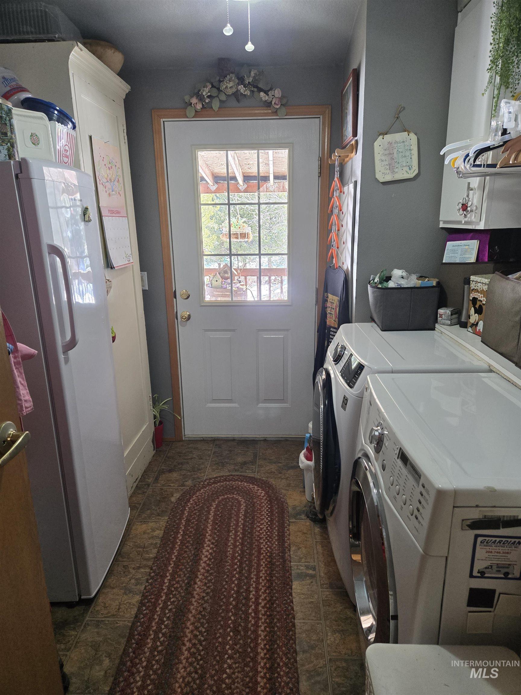 254 Lackey Road Weippe, ID 83553 - Photo 16 of 38 Laundry area featuring washing machine and clothes dryer