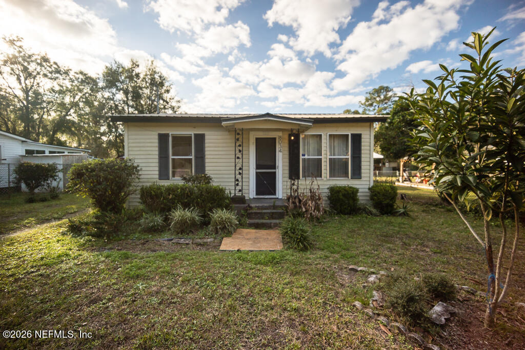 8034 Gordean Road Jacksonville, FL 32221 - Photo 13 of 37 a view of a house with a yard
