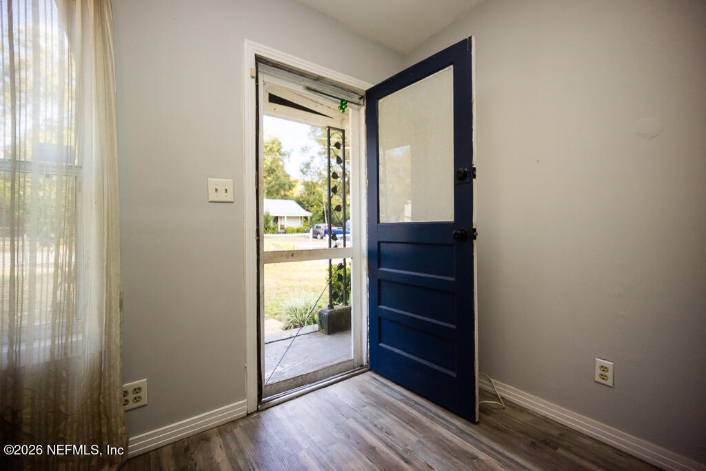 8034 Gordean Road Jacksonville, FL 32221 - Photo 17 of 37 a view of walk in closet with empty room
