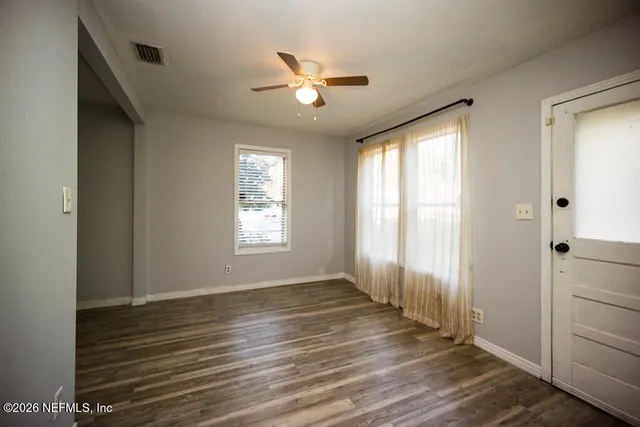 a kitchen with stainless steel appliances a refrigerator sink and cabinets